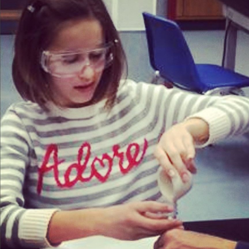 a blind girl doing an experiment 